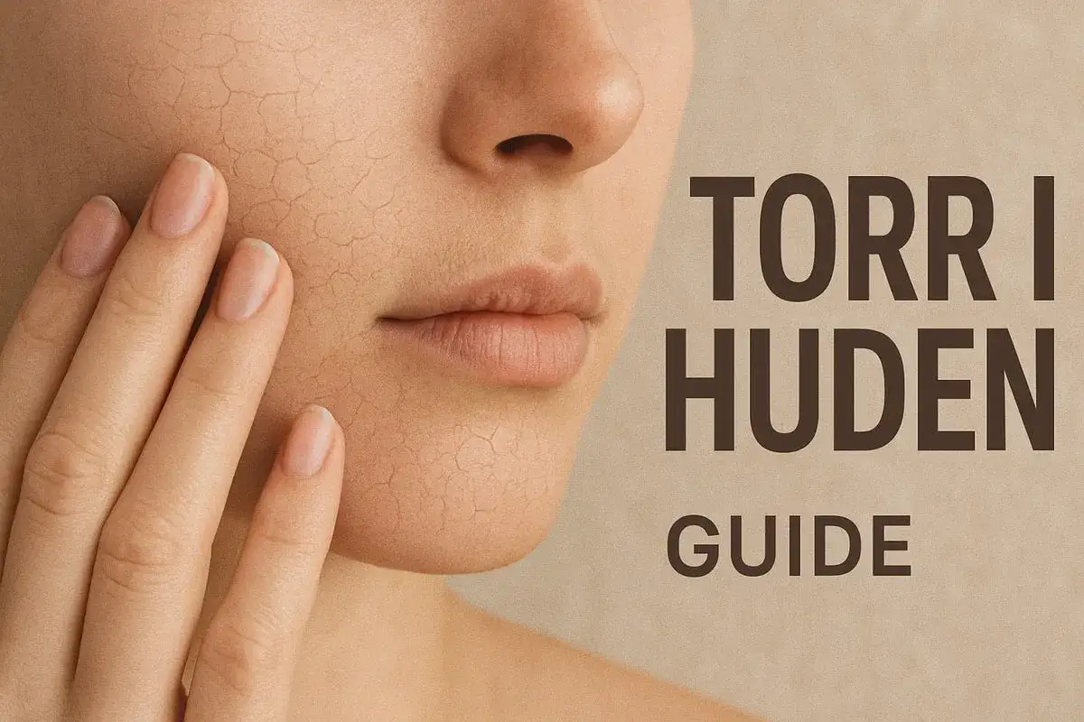 N&auml;ra bild p&aring; ett ansikte med torr hud som spricker. En hand r&ouml;r vid kinden. Text: TORR HUDEN GUIDE.
